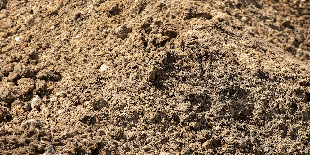 Unscreened fill dirt available in bulk for grading and leveling at JTR Garden Center